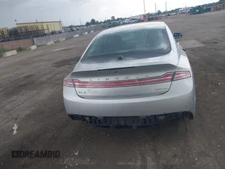 2013 Lincoln MKZ z VIN 3LN6L2G98DR803528, wystawiony jako IAAI lot #42573341 z przebiegiem 140 006 mil mil oraz . Historia ofert i sprzedaży dostępna na DreamBid. Obrazek 16.