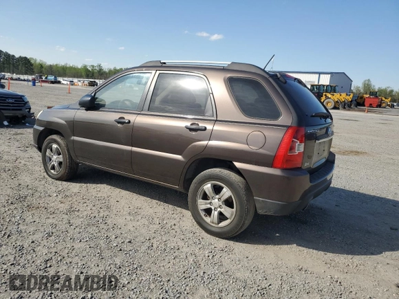 2009 Kia Sportage LX with VIN KNDJF724297573255, listed as a Copart auction lot 51300095 with 199,362 mi miles and Salvage Title. Bid and sale history available at carsss.com. Image 2.
