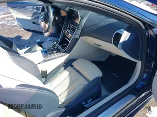 2023 BMW 8 Series z VIN WBAFY4C01PCK86940, wystawiony jako IAAI lot #41510311 z przebiegiem 15 696 mil mil oraz . Historia ofert i sprzedaży dostępna na DreamBid. Obrazek 5.