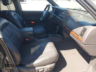 1997 Jeep Grand Cherokee Limited z VIN 1J4GZ78Y3VC683674, wystawiony jako IAAI lot #42331984 z przebiegiem 227 226 mil mil oraz . Historia ofert i sprzedaży dostępna na DreamBid. Obrazek 5.