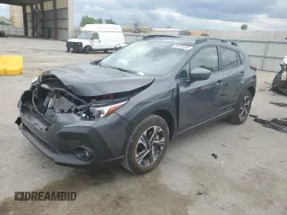 2024 Subaru Crosstrek Premium z VIN JF2GUADC6RH351346, wystawiony jako Copart lot #56195535 z przebiegiem 4 992 mil mil oraz Szkoda całkowita • Salvage title. Historia ofert i sprzedaży dostępna na DreamBid. Obrazek 1.