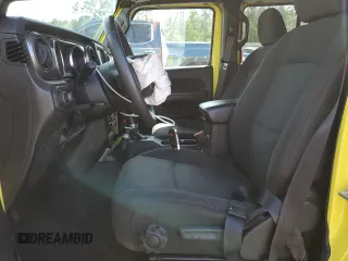 2023 Jeep Wrangler Sport S z VIN 1C4HJXDN5PW674652, wystawiony jako Copart lot #52651465 z przebiegiem 29 984 mil mil oraz Szkoda całkowita • Salvage title. Historia ofert i sprzedaży dostępna na DreamBid. Obrazek 7.