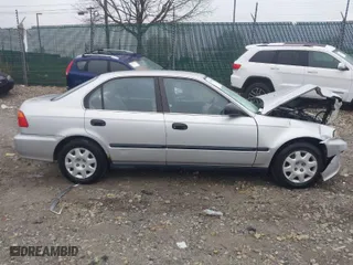 1999 Honda Civic LX with VIN 2HGEJ6675XH504044, listed as a IAAI auction lot 41949437 with 208,534 mi miles. Bid and sale history available at carsss.com. Image 12.