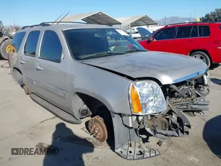 2007 GMC Yukon SLE with VIN 1GKFK130X7J131757, listed as a IAAI auction lot 41237779 with 156,148 mi miles. Bid and sale history available at carsss.com. Image 1.