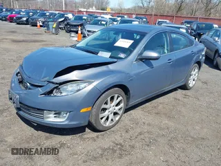 2009 Mazda 6 S Grand Touring with VIN 1YVHP82B795M01762, listed as a IAAI auction lot 41925269 with 163,967 mi miles and . Bid and sale history available at DreamBid. Image 18.