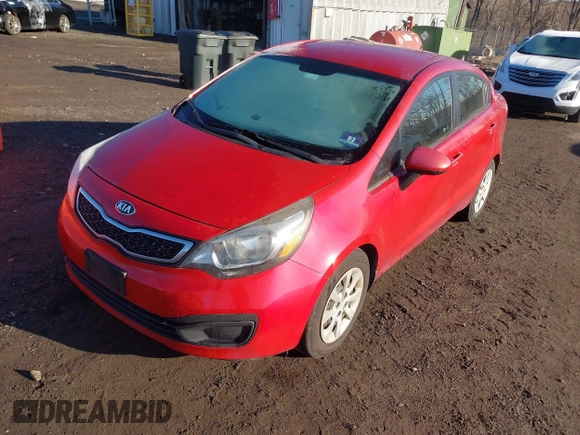 2015 Kia Rio EX with VIN KNADN4A36F6427415, listed as a IAAI auction lot 41671078 with 137,013 mi miles. Bid and sale history available at carsss.com. Image 2.