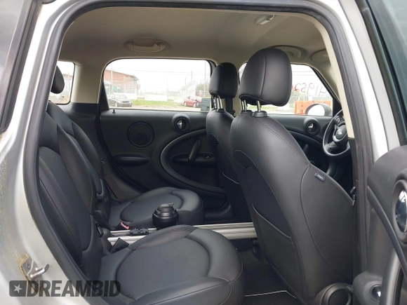 2011 MINI Countryman S with VIN WMWZC5C51BWM10385, listed as a IAAI auction lot 41952679 with 112,008 mi miles and . Bid and sale history available at DreamBid. Image 8.