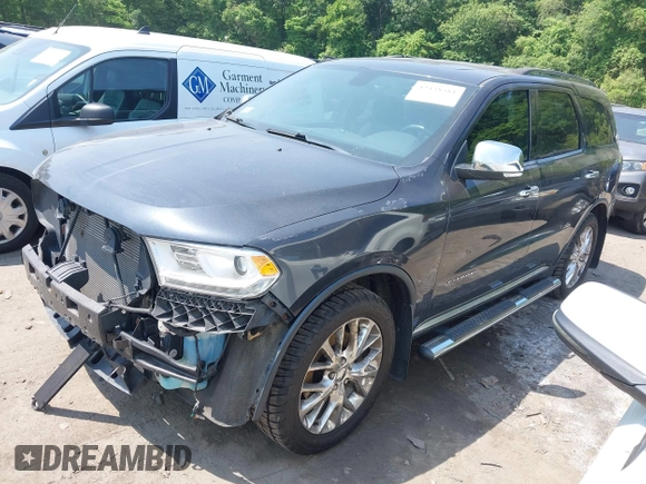 2014 Dodge Durango Citadel with VIN 1C4RDJEG8EC480656, listed as a IAAI auction lot 42438581 with 182,615 mi miles and . Bid and sale history available at DreamBid. Image 2.