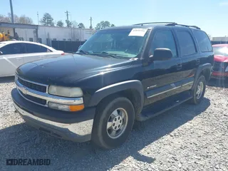 2002 Chevrolet Tahoe LT with VIN 1GNEC13Z42R245581, listed as a IAAI auction lot 41810788 with 228,166 mi miles. Bid and sale history available at carsss.com. Image 2.