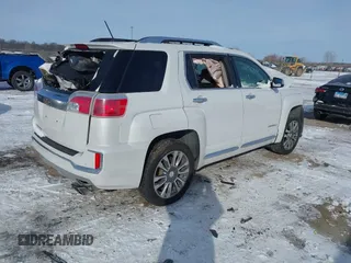 2016 GMC Terrain Denali z VIN 2GKFLRE36G6215185, wystawiony jako IAAI lot #41578029 z przebiegiem Nie podano mil oraz . Historia ofert i sprzedaży dostępna na DreamBid. Obrazek 4.