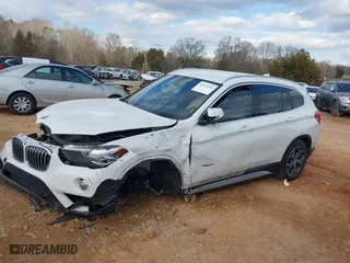 2018 BMW X1 sDrive28i with VIN WBXHU7C37J5H39401, listed as a IAAI auction lot 41421610 with 94,576 mi miles. Bid and sale history available at carsss.com. Image 14.
