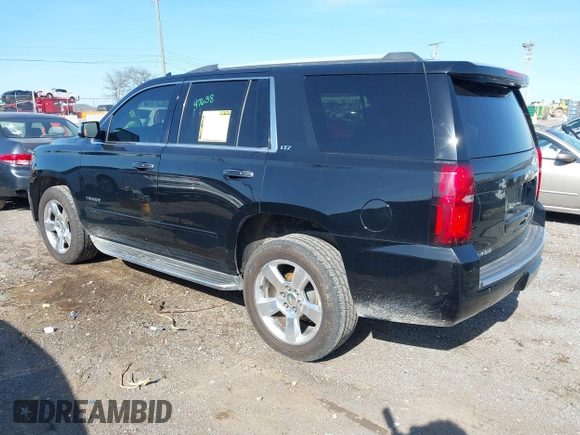 2016 Chevrolet Tahoe LTZ with VIN 1GNSCCKC2GR126687, listed as a IAAI auction lot 41952725 with 202,016 mi miles and . Bid and sale history available at DreamBid. Image 3.