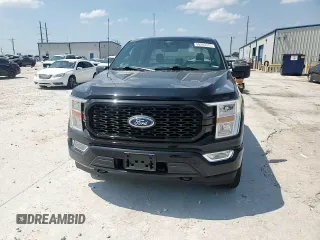 2021 Ford F-150 XL with VIN 1FTEW1EP9MFB94496, listed as a Copart auction lot 59283315 with 30,753 mi miles and Salvage title. Bid and sale history available at DreamBid. Image 13.