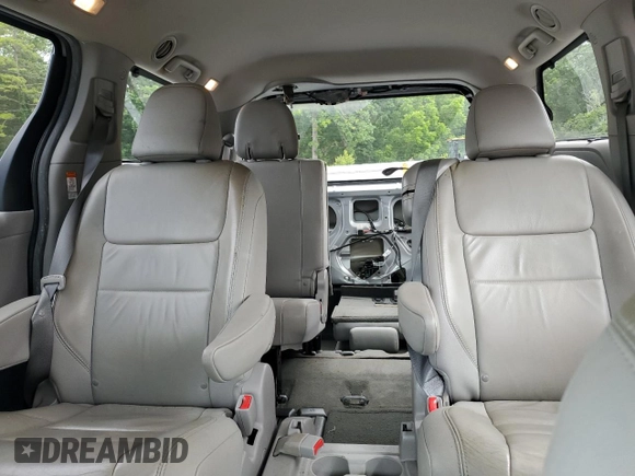 2016 Toyota Sienna XLE with VIN 5TDYK3DC8GS715148, listed as a Copart auction lot 57834045 with 128,769 mi miles and Salvage title. Bid and sale history available at DreamBid. Image 10.
