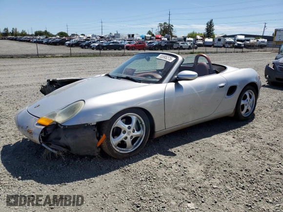 1998 Porsche Boxster z VIN WP0CA2986WU620657, wystawiony jako Copart lot #55595275 z przebiegiem 78 711 mil mil oraz Szkoda całkowita • Salvage title. Historia ofert i sprzedaży dostępna na DreamBid. Obrazek 1.