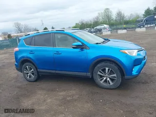 2017 Toyota RAV4 XLE with VIN JTMRFREV4HJ123496, listed as a IAAI auction lot 42068817 with 211,682 mi miles. Bid and sale history available at carsss.com. Image 13.