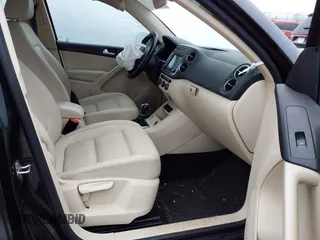 2017 Volkswagen Tiguan S with VIN WVGBV7AX8HK027148, listed as a IAAI auction lot 41215649 with 132,690 mi miles and . Bid and sale history available at DreamBid. Image 5.