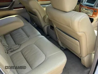 2007 Lexus LX 470 z VIN JTJHT00W174024015, wystawiony jako Copart lot #59439085 z przebiegiem 190 436 mil mil oraz Czysty tytuł • Clean title. Historia ofert i sprzedaży dostępna na DreamBid. Obrazek 6.