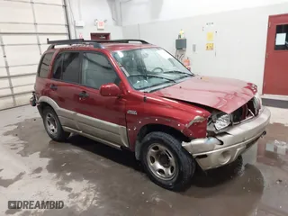 2002 Suzuki Grand Vitara JLX with VIN JS3TD62VX24155102, listed as a IAAI auction lot 41603245 with 152,657 mi miles. Bid and sale history available at carsss.com. Image 1.