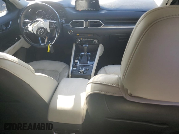 2017 Mazda CX-5 Grand Touring with VIN JM3KFADL1H0141132, listed as a Copart auction lot 51755095 with 116,220 mi miles and Salvage Title. Bid and sale history available at carsss.com. Image 8.