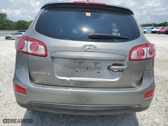 2012 Hyundai Santa Fe SE with VIN 5XYZHDAG2CG106869, listed as a Copart auction lot 75944384 with 186,373 mi miles and Salvage Title. Bid and sale history available at carsss.com. Image 6.