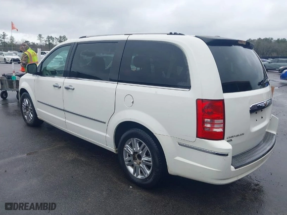 2010 Chrysler Town & Country Limited with VIN 2A4RR6DX1AR141930, listed as a IAAI auction lot 41557272 with NaN miles. Bid and sale history available at carsss.com. Image 3.