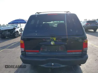 1999 Mercury Mountaineer z VIN 4M2ZU52P9XUJ11372, wystawiony jako IAAI lot #41849011 z przebiegiem 286 379 mil mil oraz . Historia ofert i sprzedaży dostępna na DreamBid. Obrazek 16.