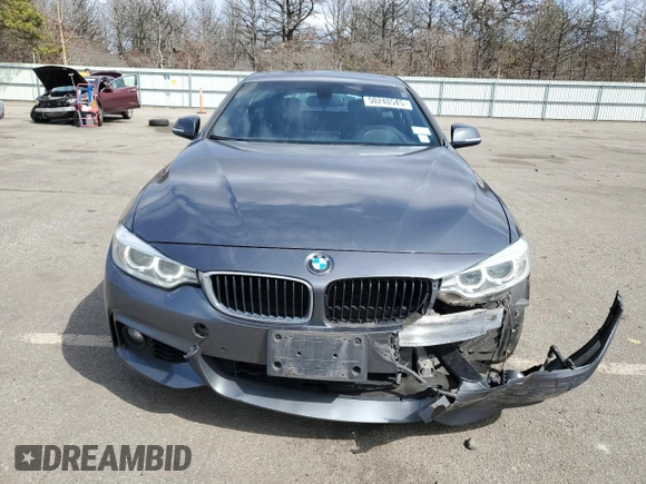 2016 BMW 4 Series 428i xDrive with VIN WBA4C9C50GG137720, listed as a Copart auction lot 50240545 with 60,705 mi miles and Salvage Title. Bid and sale history available at DreamBid. Image 5.