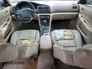 1998 Mazda 626 DX with VIN 1YVGF22CXW5775511, listed as a Copart auction lot 78748784 with 158,570 mi miles and Salvage Title. Bid and sale history available at carsss.com. Image 8.