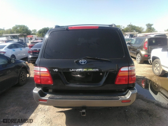 2001 Toyota Land Cruiser with VIN JTEHT05J512016563, listed as a IAAI auction lot 41868193 with 247,653 mi miles. Bid and sale history available at carsss.com. Image 16.