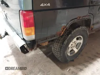 1998 Jeep Cherokee Sport z VIN 1J4FJ68S2WL142027, wystawiony jako IAAI lot #42305669 z przebiegiem 249 580 mil mil oraz . Historia ofert i sprzedaży dostępna na DreamBid. Obrazek 13.