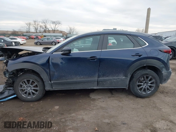 2022 Mazda CX-30 S with VIN 3MVDMBAL8NM411739, listed as a IAAI auction lot 41668265 with 34,964 mi miles and . Bid and sale history available at carsss.com. Image 13.