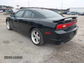 2013 Dodge Charger SXT with VIN 2C3CDXHG2DH525370, listed as a IAAI auction lot 41395980 with 226,079 mi miles. Bid and sale history available at carsss.com. Image 3.