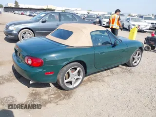 2001 Mazda MX-5 Miata z VIN JM1NB353110214307, wystawiony jako IAAI lot #42407414 z przebiegiem 158 400 mil mil oraz . Historia ofert i sprzedaży dostępna na DreamBid. Obrazek 4.