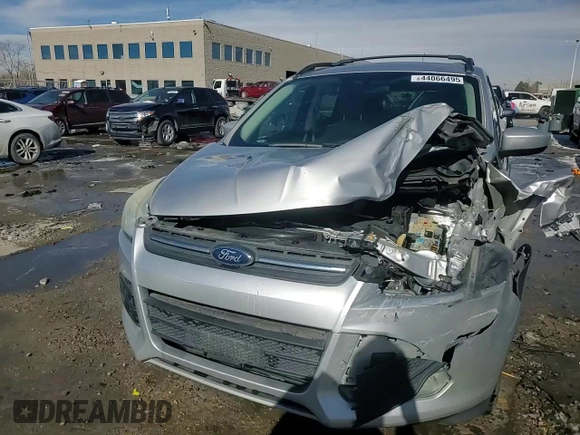 2013 Ford Escape SE z VIN 1FMCU9GX8DUD94480, wystawiony jako Copart lot #44066495 z przebiegiem 174 047 mil mil oraz Szkoda całkowita • Salvage title. Historia ofert i sprzedaży dostępna na DreamBid. Obrazek 14.