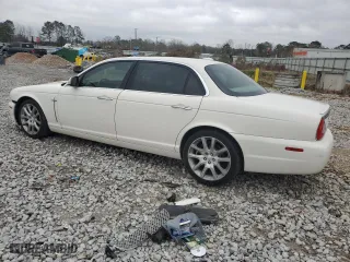 2008 Jaguar XJ with VIN SAJWA79B48SH21186, listed as a Copart auction lot 43704975 with 197,944 mi miles and Salvage Title. Bid and sale history available at carsss.com. Image 2.