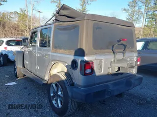 2018 Jeep Wrangler Unlimited Sport S z VIN 1C4HJXDG0JW158935, wystawiony jako IAAI lot #41187384 z przebiegiem 69 721 mil mil oraz . Historia ofert i sprzedaży dostępna na DreamBid. Obrazek 3.