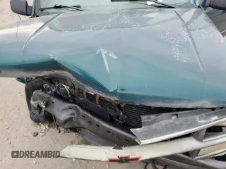 1998 Chevrolet Tahoe z VIN 3GNEK18R4WG128424, wystawiony jako Copart lot #79684984 z przebiegiem 217 456 mil mil oraz Szkoda całkowita • Salvage title. Historia ofert i sprzedaży dostępna na DreamBid. Obrazek 11.