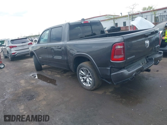 2022 Ram 1500 Laramie with VIN 1C6SRFJT3NN400159, listed as a IAAI auction lot 42167812 with 16,790 mi miles and . Bid and sale history available at DreamBid. Image 3.