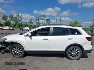2014 Mazda CX-9 Grand Touring with VIN JM3TB2DA8E0436650, listed as a IAAI auction lot 42147525 with 124,179 mi miles and . Bid and sale history available at DreamBid. Image 14.