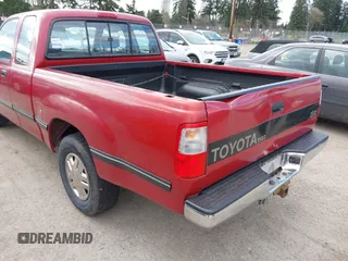 1995 Toyota T100 DX with VIN JT4VD12E6S0005957, listed as a IAAI auction lot 41943578 with 128,489 mi miles. Bid and sale history available at carsss.com. Image 6.