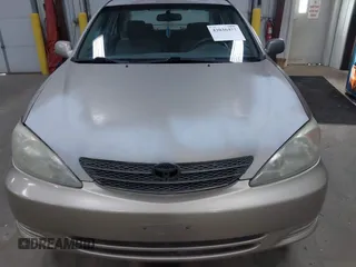 2004 Toyota Camry LE with VIN 4T1BE32K24U852256, listed as a IAAI auction lot 42036477 with 154,389 mi miles. Bid and sale history available at carsss.com. Image 6.