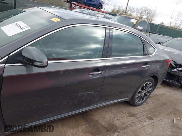 2018 Toyota Avalon XLE with VIN 4T1BK1EB9JU275097, listed as a IAAI auction lot 41940585 with 119,854 mi miles and . Bid and sale history available at DreamBid. Image 14.
