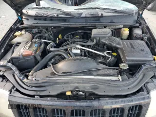 1999 Jeep Grand Cherokee Limited with VIN 1J4GW68S7XC676809, listed as a Copart auction lot 79059944 with 196,391 mi miles and Salvage Title. Bid and sale history available at carsss.com. Image 12.