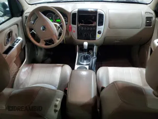 2007 Mercury Mariner Premier with VIN 4M2CU97127KJ20010, listed as a Copart auction lot 52123205 with 162,337 mi miles and Salvage title. Bid and sale history available at DreamBid. Image 8.