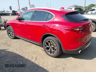 2019 Alfa Romeo Stelvio Ti z VIN ZASPAKBNXK7C31179, wystawiony jako IAAI lot #42489493 z przebiegiem 53 843 mil mil oraz . Historia ofert i sprzedaży dostępna na DreamBid. Obrazek 3.