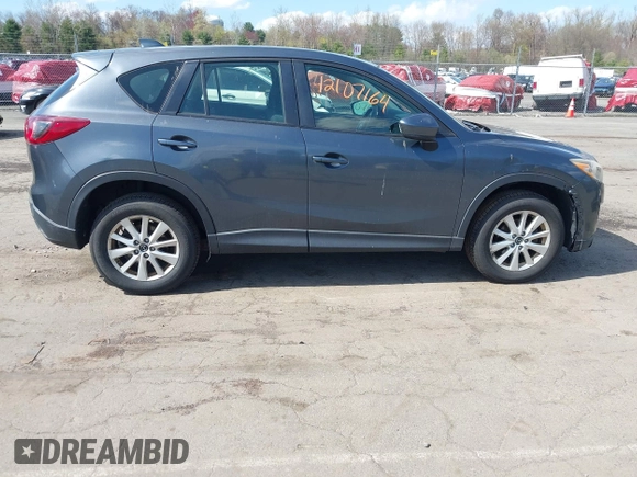 2013 Mazda CX-5 Sport with VIN JM3KE4BE7D0164398, listed as a IAAI auction lot 42107164 with 166,852 mi miles. Bid and sale history available at carsss.com. Image 13.