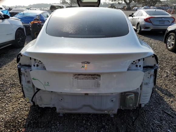 2021 Tesla Model 3 Standard Range Plus z VIN 5YJ3E1EA3MF855031, wystawiony jako Copart lot #51135295 z przebiegiem 41 488 mil mil oraz Szkody całkowita. Historia ofert i sprzedaży dostępna na DreamBid. Obrazek 6.