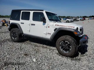 2025 Jeep Wrangler Rubicon with VIN 1C4PJXFN2SW525858, listed as a Copart auction lot 57415905 with 7,802 mi miles and Salvage title. Bid and sale history available at DreamBid. Image 4.