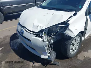 2014 Toyota Prius One with VIN JTDKDTB31E1566854, listed as a IAAI auction lot 41887601 with 232,066 mi miles and . Bid and sale history available at DreamBid. Image 6.